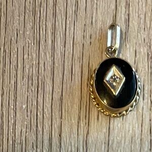 10k gold and onyx stone charm